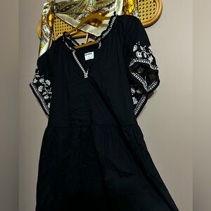 Women’s fit & flare casual knee-length dress. New with tags